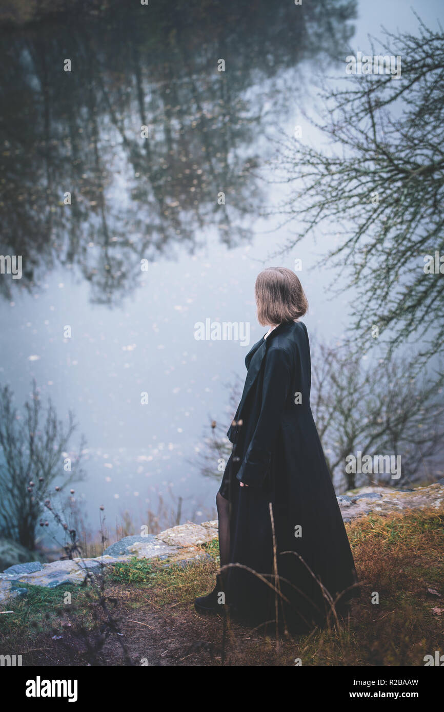 Woman cliff cloak hi-res stock photography and images - Alamy