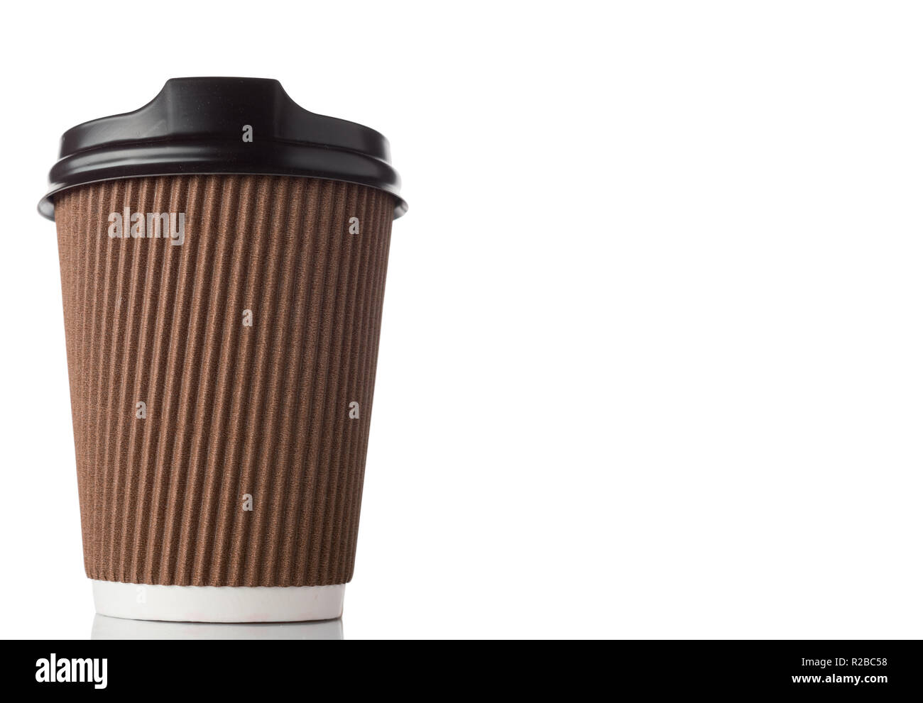 Blank kraft paper coffee cup with cap. Disposable cup with copy space Stock Photo