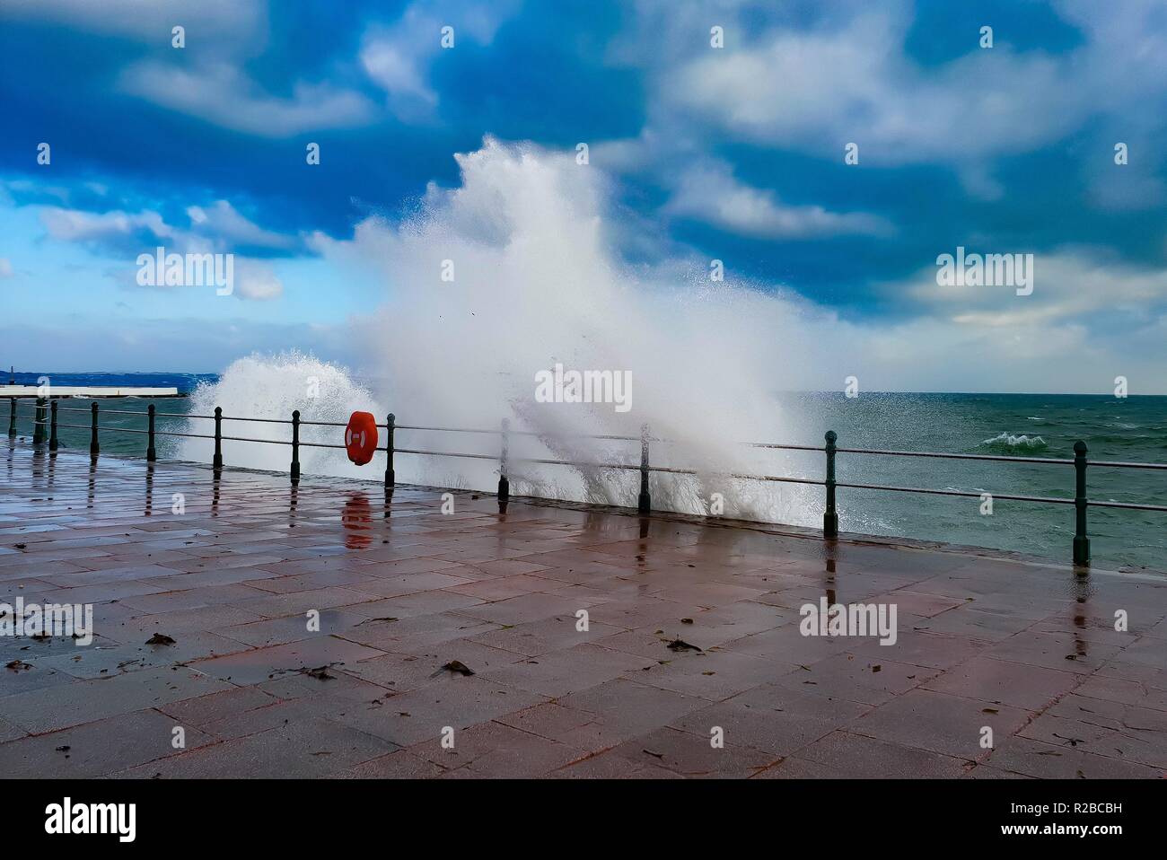 Waves washing over Penzance promenade in Cornwall, UK. Stock Photo
