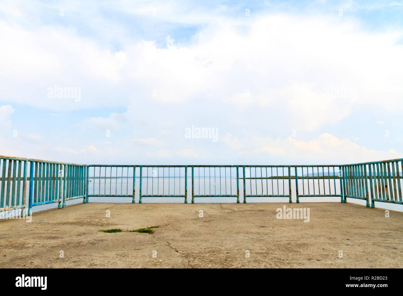 fence and a huge blue sky with clouds Stock Photo - Alamy