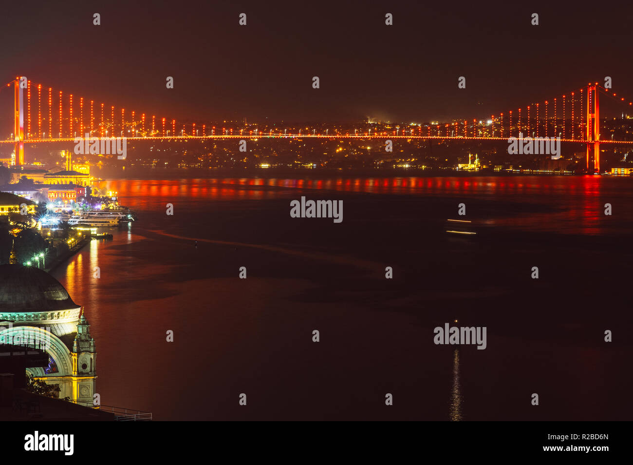 Night view to Bosphorus bridge and Camlica Cami, Istanbul, Turkey Stock Photo