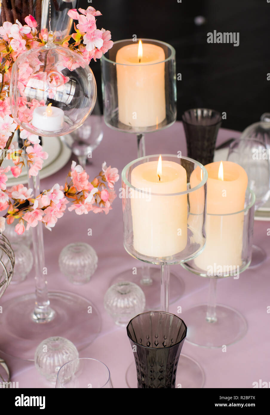Wedding decoration for banquet with sakura and candles Stock Photo