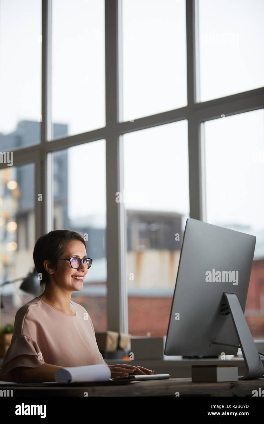 Designer working in studio Stock Photo - Alamy