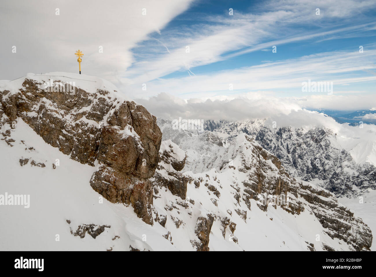 The Zugspitze with summit cross in winter Stock Photo