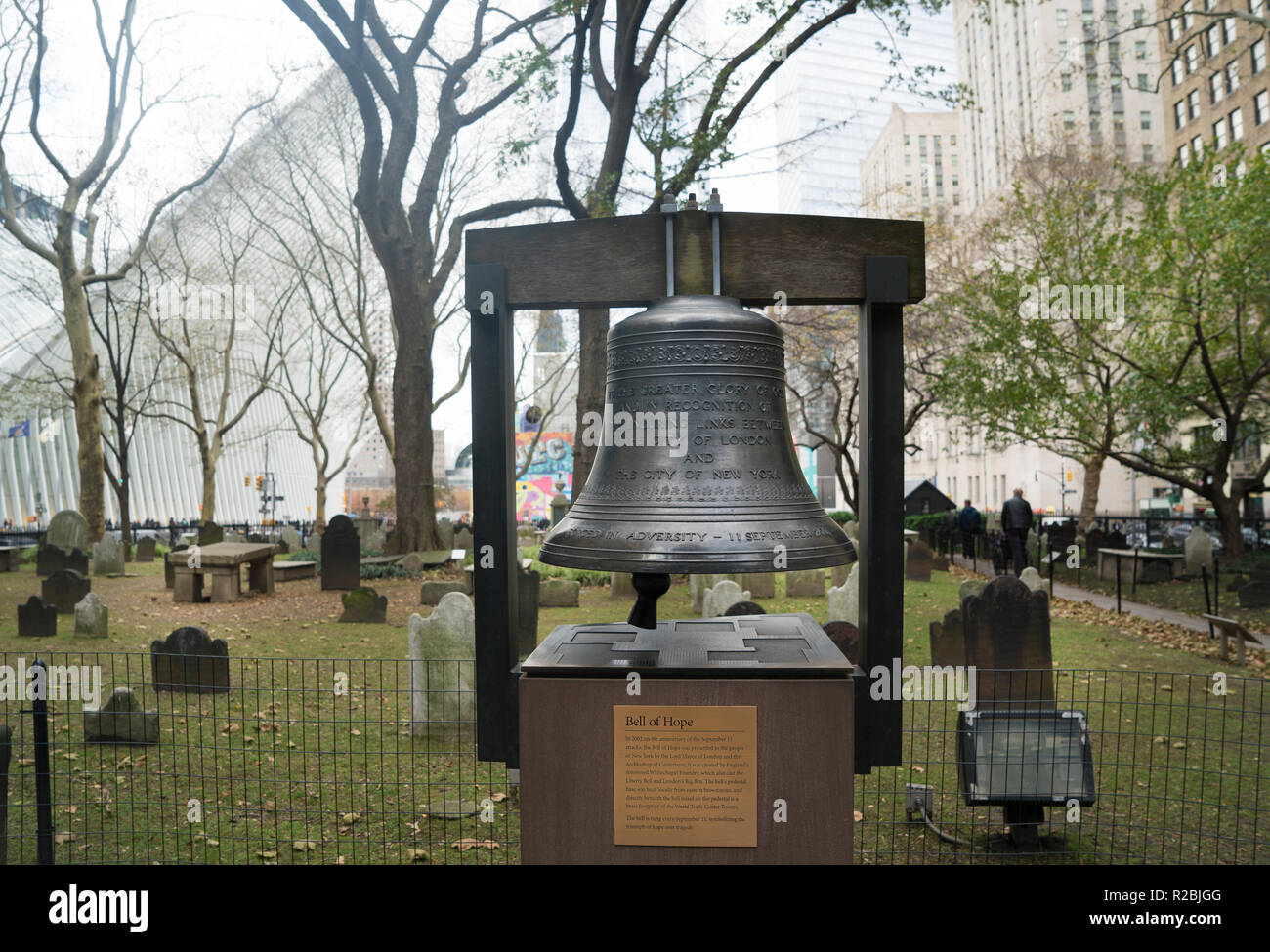 The Bell of Hope in the graveyard of St. Paul’s Chapel in Lower Manhattan was presented to Trinity Wall Street after the World Trade Center attack. Stock Photo