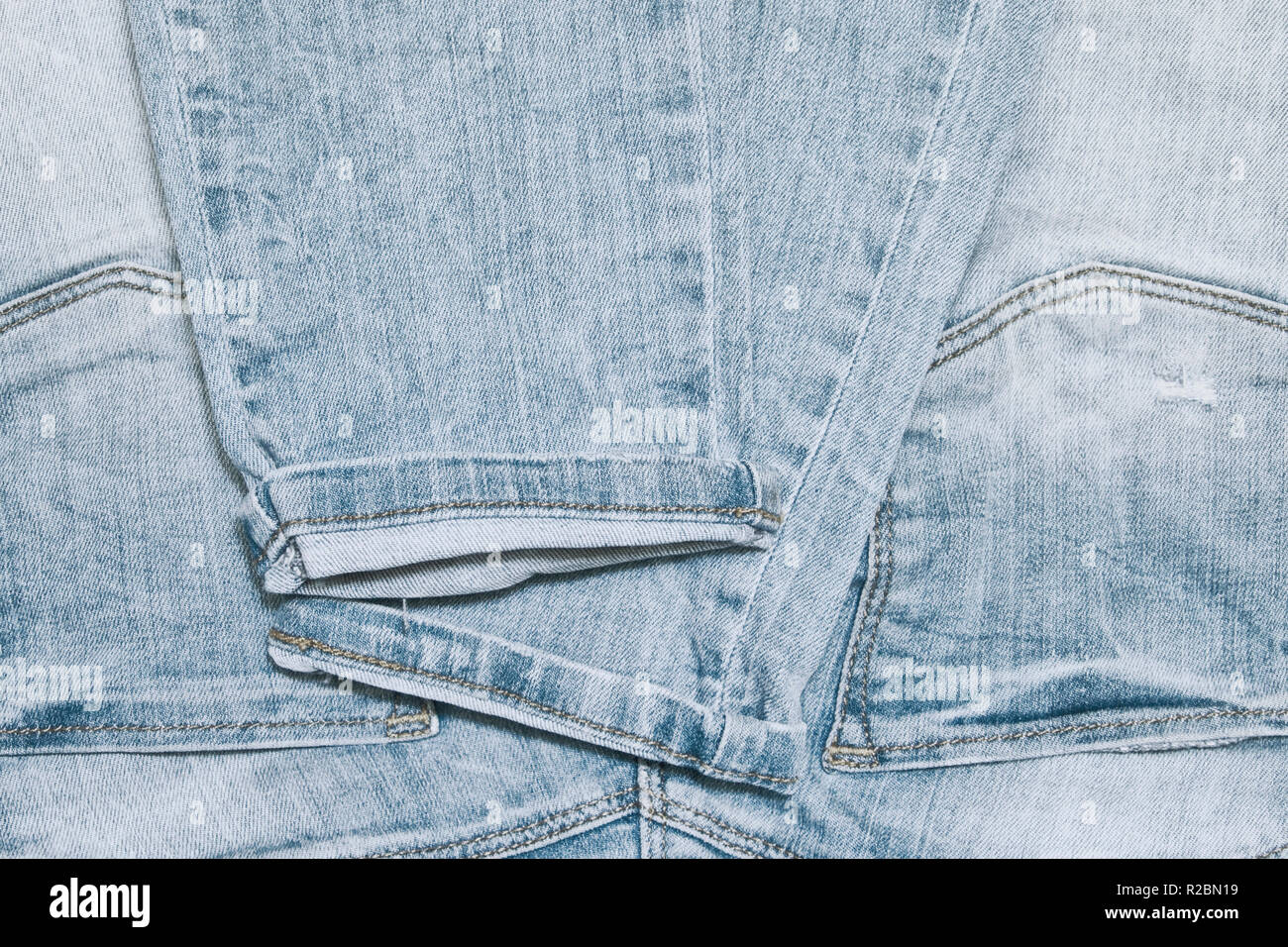 The folded light jeans with pockets texture of denim Stock Photo