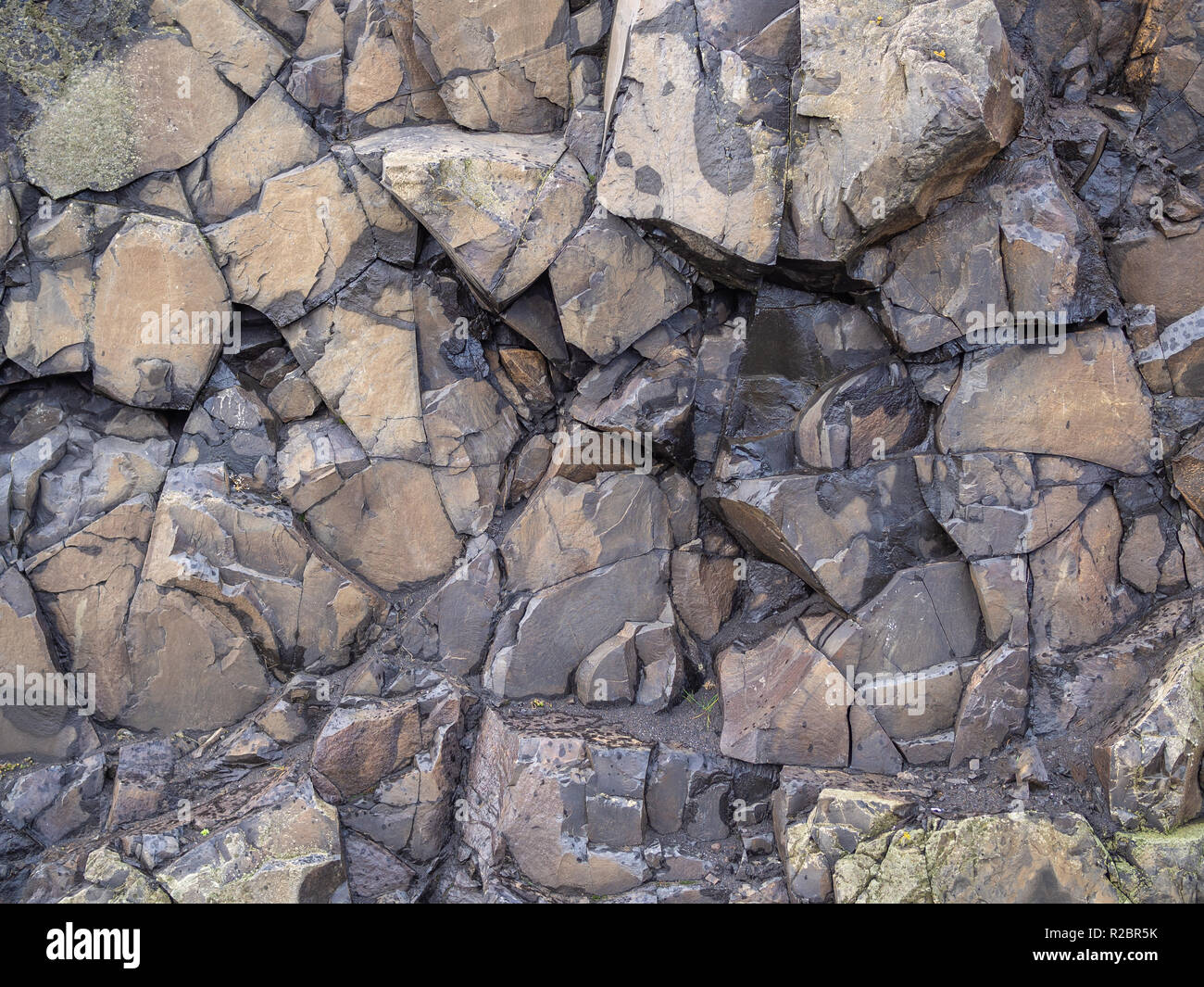 Premium Photo  Texture of mountains. dangerous sharp rocks. sharp stones  background. abstract texture of split stone in dark gray color. big cracked  pointed stones closeup.