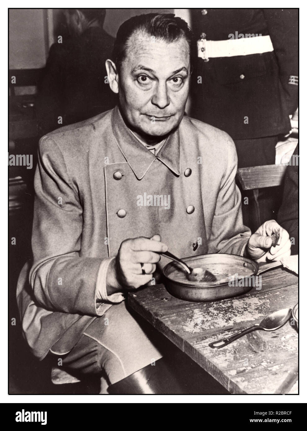 Hermann Goering Head of Nazi Luftwaffe Germany. The Third Reich's Field Marshal and commander of all German air forces during a meal break at The Nuremberg trials in October/November 1945. He committed suicide in his cell after his conviction and death sentence by International Military Tribunal at the Nuremberg war crimes trials for crimes against humanity November 1946. Stock Photo