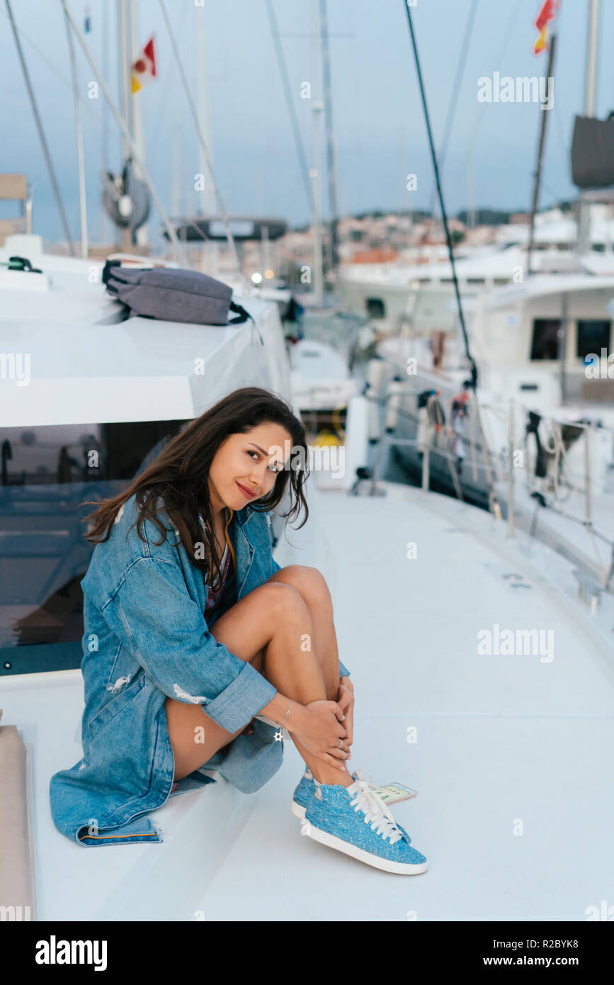 Young Beautiful Girl Is Sitting On The Deck Of A Yacht Stock Photo Alamy Young Beautiful Girl Is Sitting On The Deck Of A Yacht Stock Photo Alamy