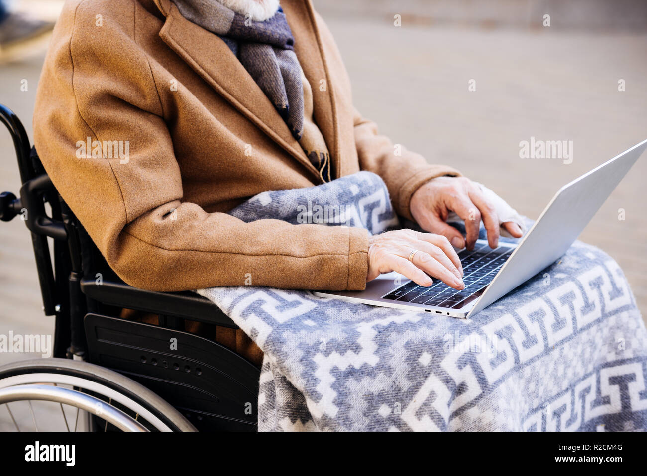 Person in wheelchair using hi-res stock photography and images - Alamy
