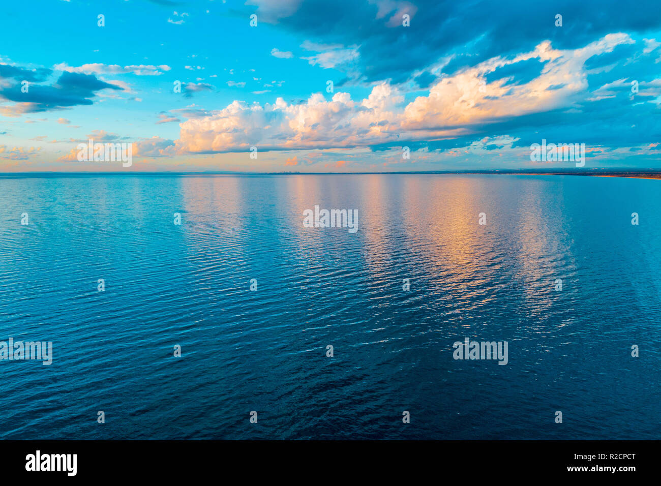 Clouds reflecting in calm water hi-res stock photography and images - Alamy