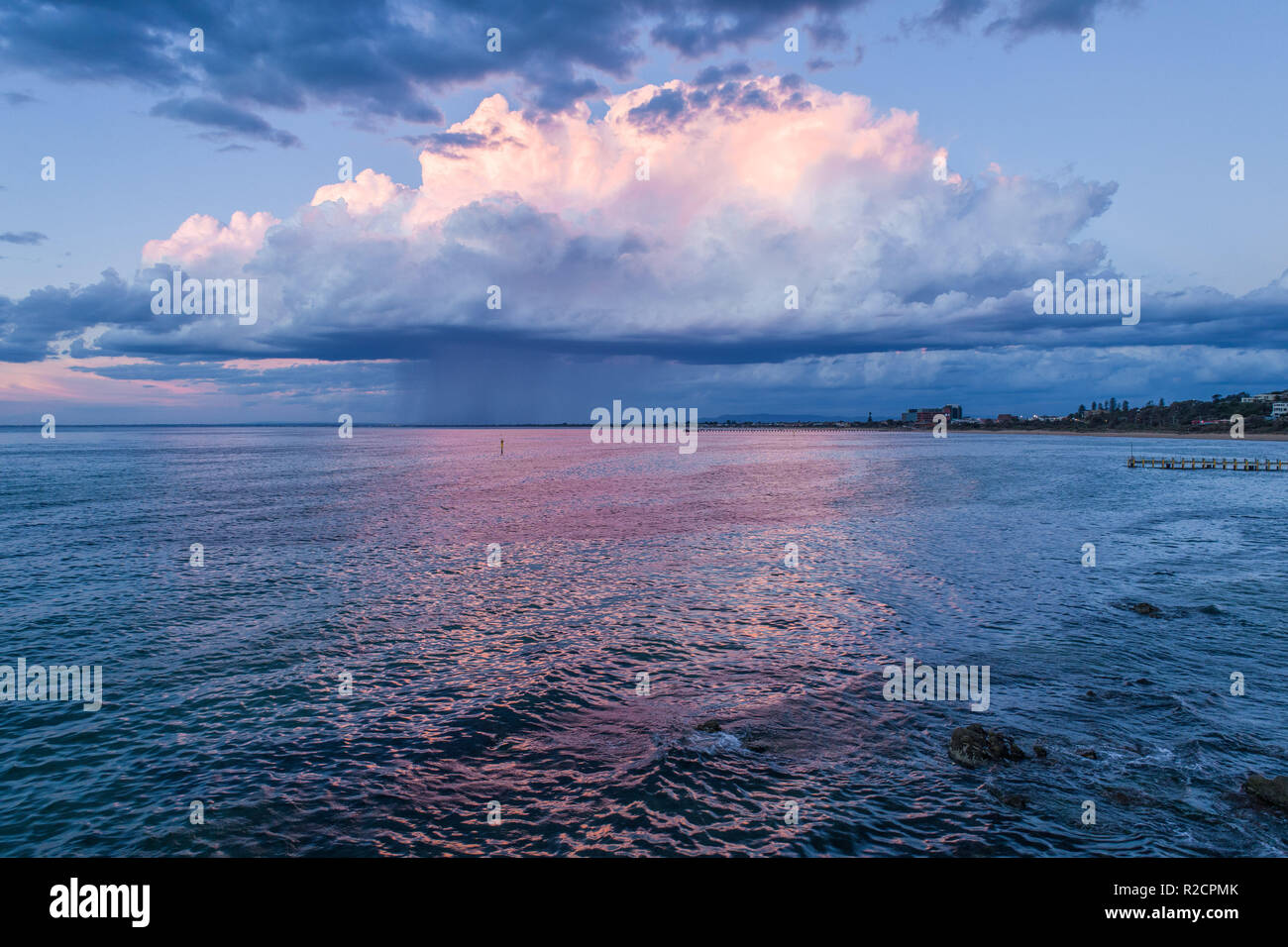 Rain clouds sunset over city hi-res stock photography and images - Alamy
