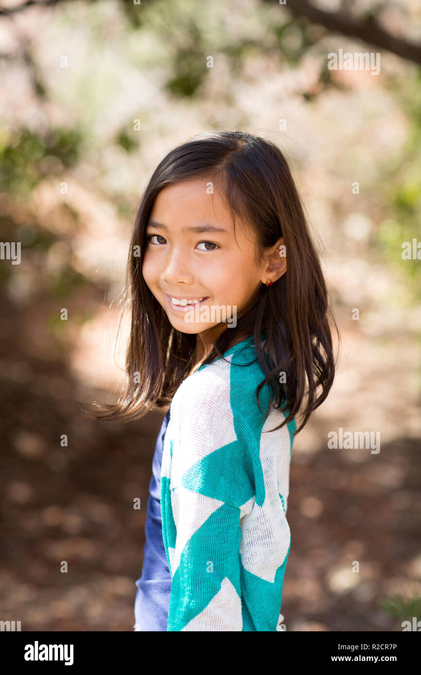 Young asian girl smiling hi-res stock photography and images - Alamy