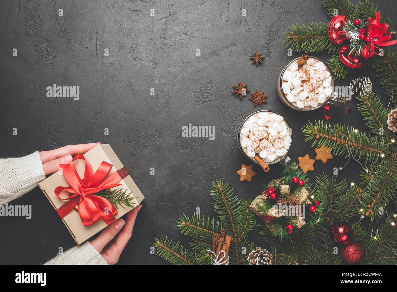 Christmas Background Fir Tree Hot Chocolate Decorations Gift Box And Gingerbread Cookies Stars. Winter Holidays Concept Stock Photo