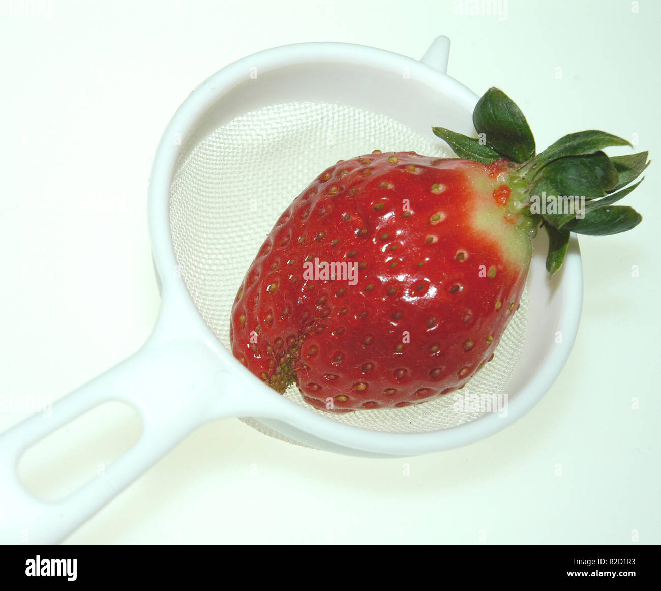 strawberry in the colander Stock Photo