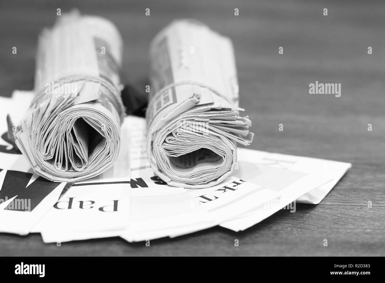 Morning newspapers and journals on table at office. Latest financial and business news in daily papers. Pages with headlines, articles, photos, text Stock Photo