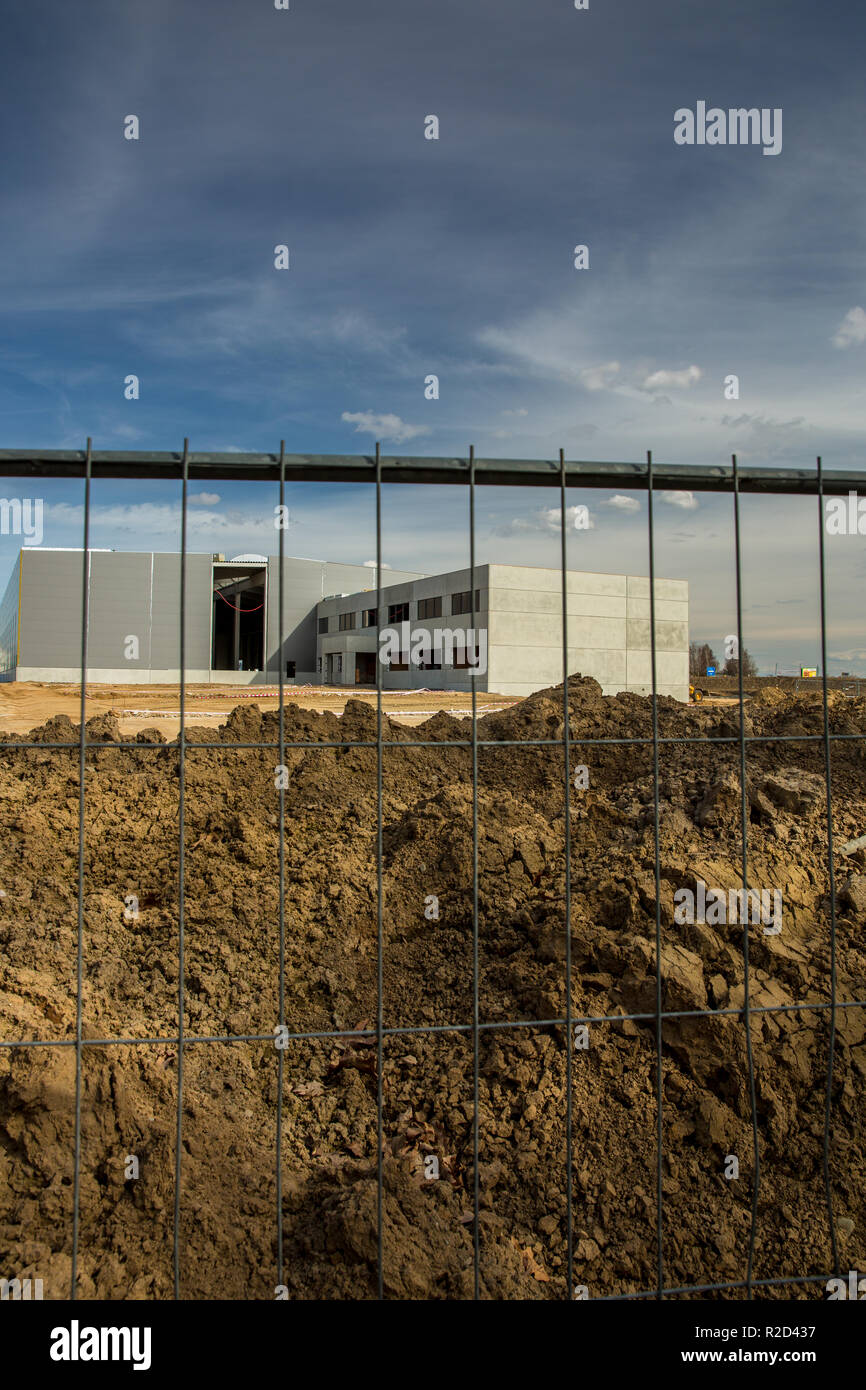 Construction site with a fence around it Stock Photo - Alamy