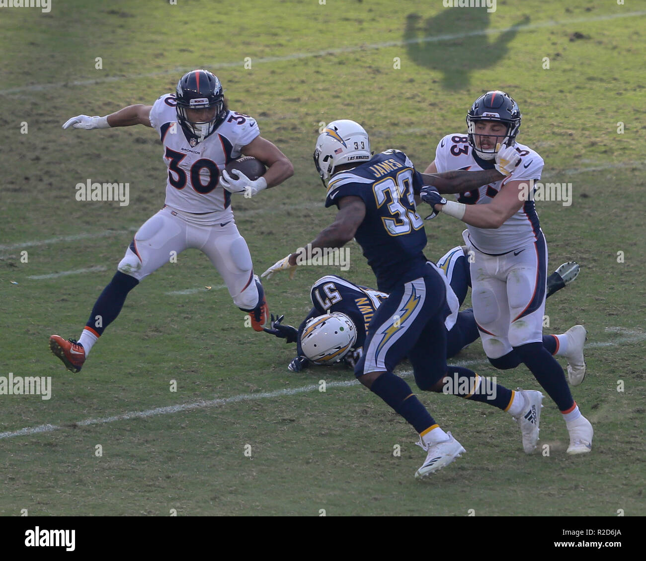 Carson, CA. 18th Nov, 2018. Los Angeles Chargers running back Austin Ekeler  #30 after a catch straight arming Denver Broncos inside linebacker Josey  Jewell #47 during the NFL Denver Broncos vs Los