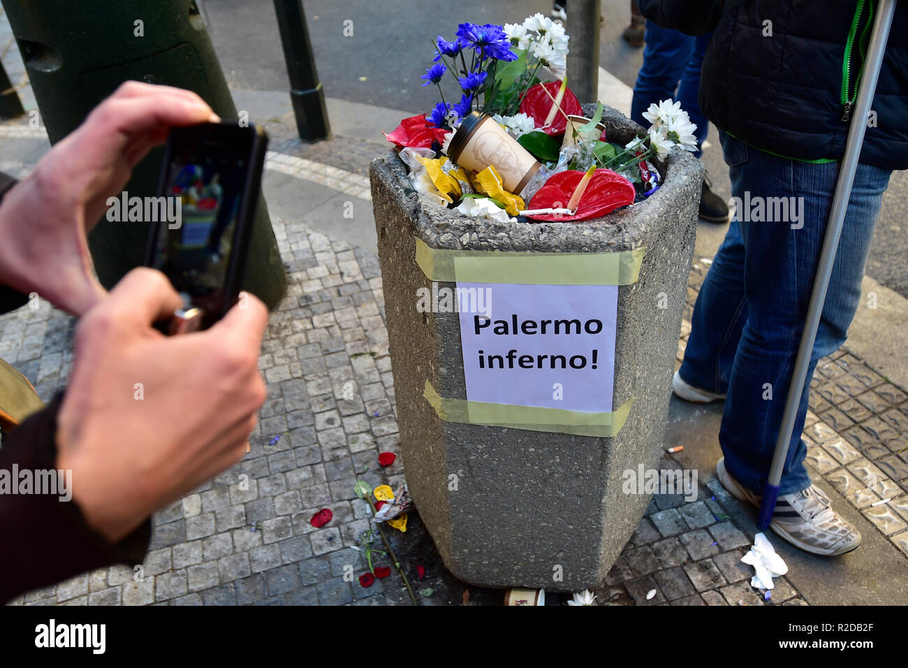 A tense atmosphere surrounded Czech politicians' acts of marking the November 17, 1989 anniversary at the memorial in the centre of Prague, Czech Republic, on November 17, 2018, with the flowers laid by PM Andrej Babis ending up in a dustbin and Deputy PM Jan Hamacek being booed by the crowd. Babis laid flowers at the memorial in Prague's Narodni street shortly after midnight. In the morning, the arriving crowd removed them and threw them into a dustbin. (CTK Photo/Roman Vondrous) Stock Photo