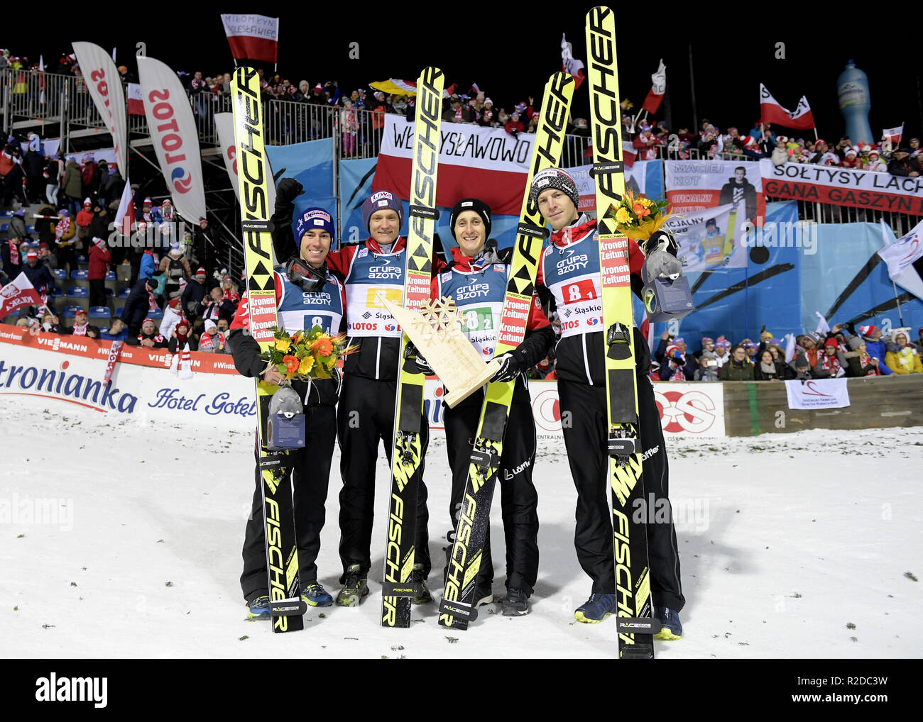 Michael Haybock, Clemens Aigner, Daniel Huber, Stefan Kraft  Poland wins the first team competition of the season in ski jumping on November 17, 2018 in Wisla, Poland. Stock Photo