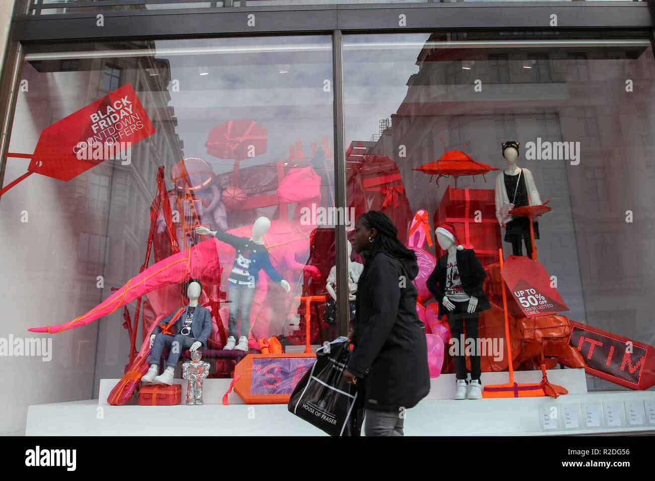 A woman seen at the London Õs Regents Street as the H&M store prepares for  the Black Friday Event with huge savings. Black Friday is a shopping event  that originated from the