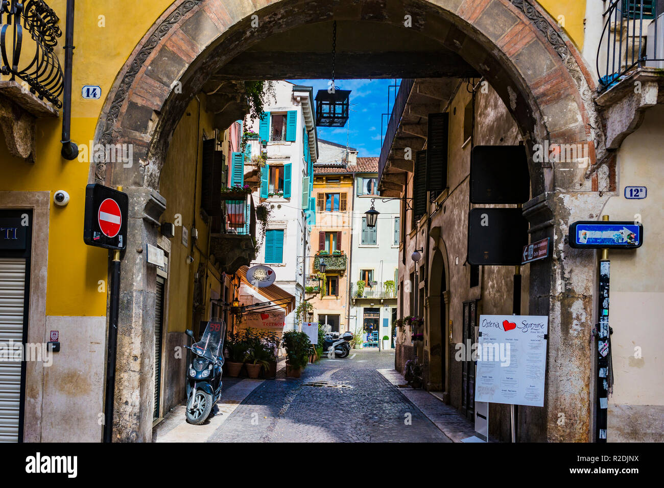 Narrow and colorful street of the historic center. Verona, Veneto, Italy, Europe Stock Photo
