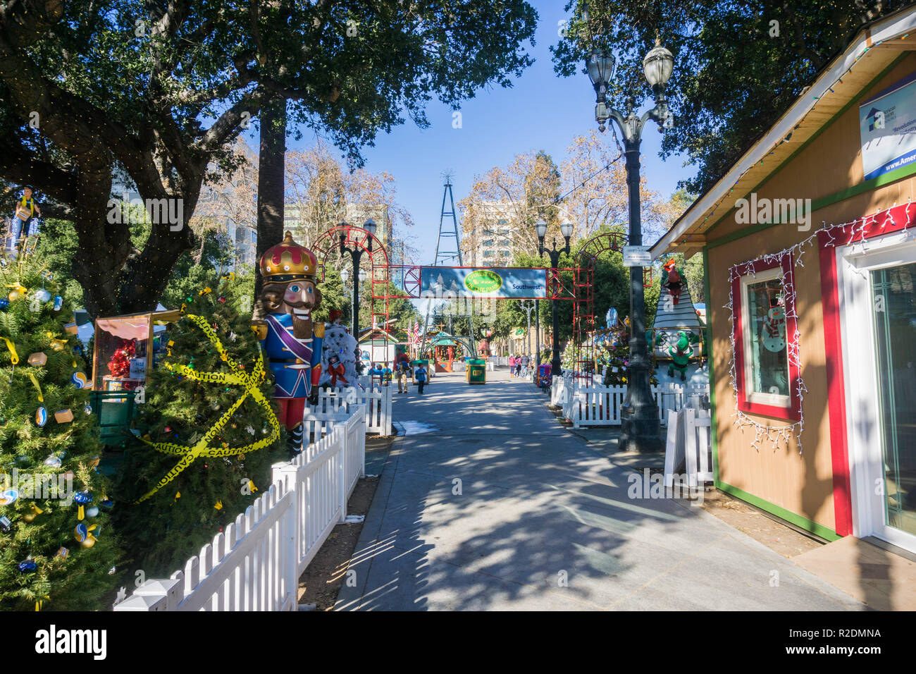December 6, 2017 San Jose / CA / USA - Alley and exhibits at 'Christmas in the park' event in Plaza de Cesar Chavez, Silicon Valley, south San Francis Stock Photo
