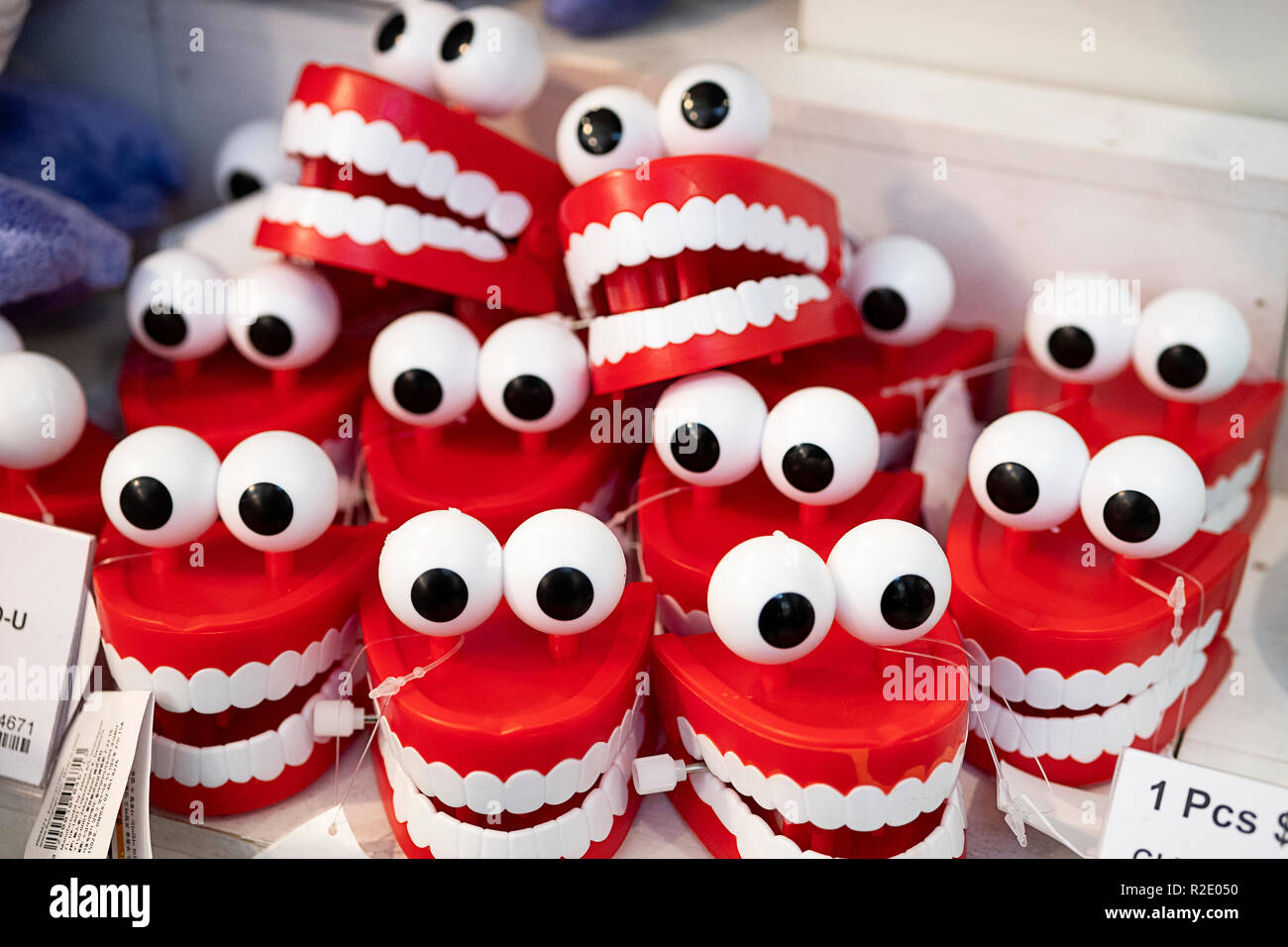 Wind up chattering teeth for sale at Flying Tiger Copenhagen, a Danish chain store with inexpensive household items Manhattan, New York City Stock Photo