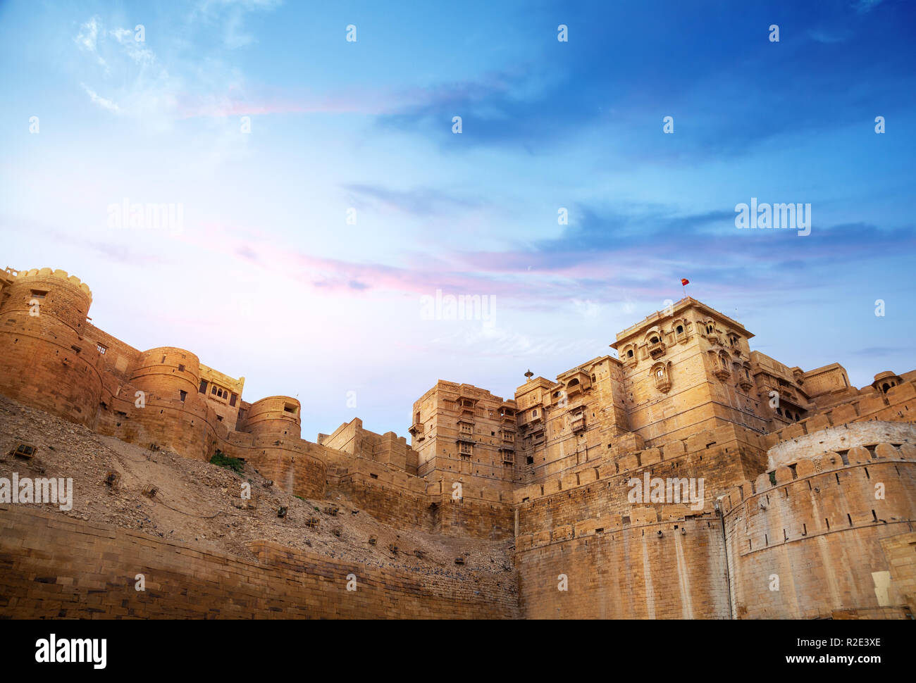 Jaisalmer fort wall at sunrise blue sky in Rajasthan, India Stock Photo