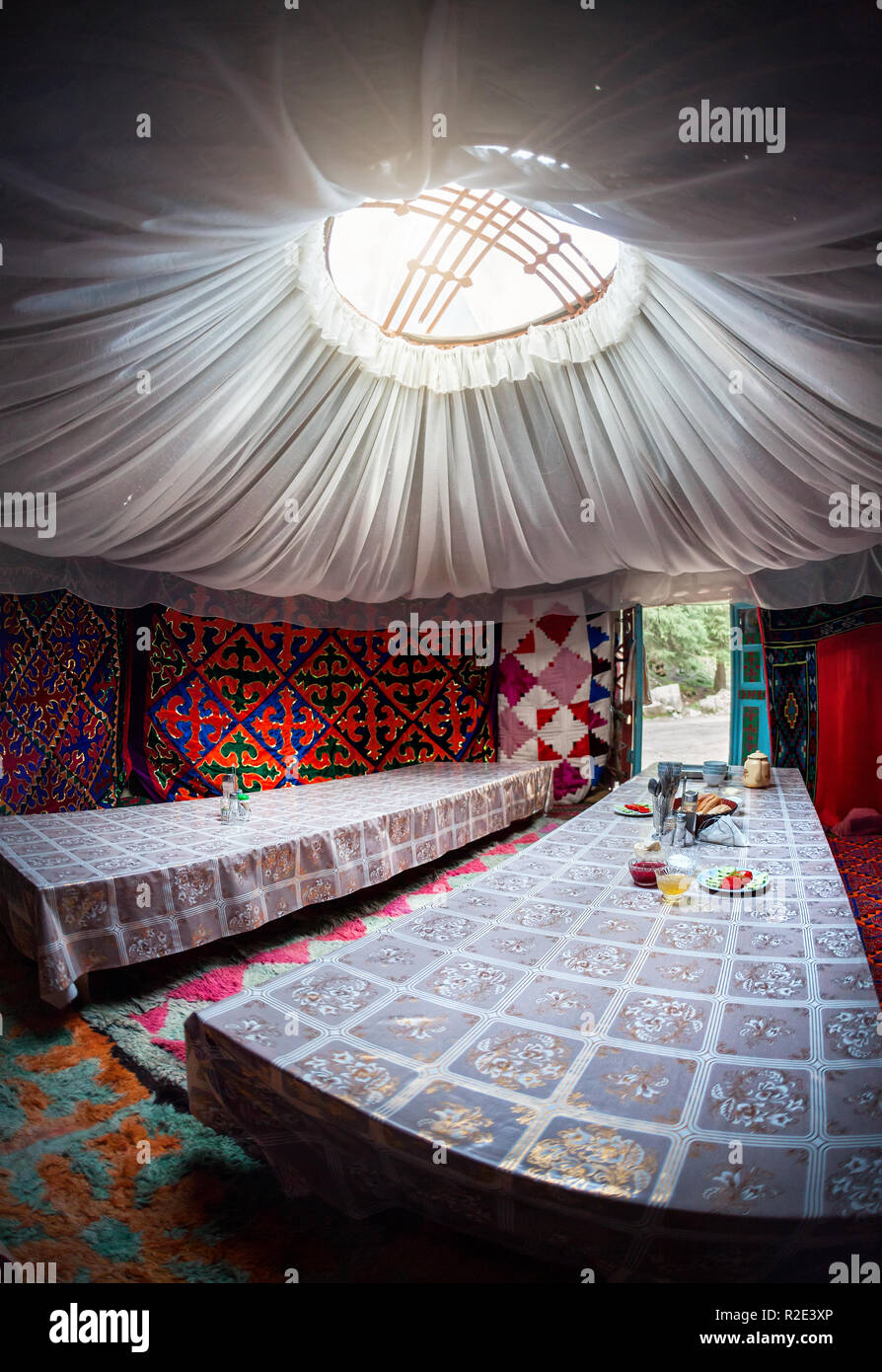 Ethnic nomadic house yurt interior in Gregory gorge, Kyrgyzstan Stock Photo