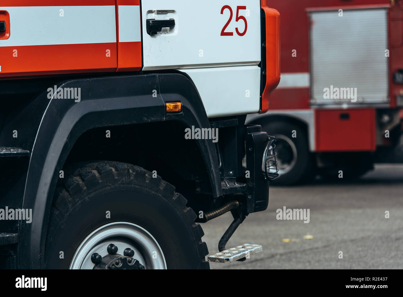 close up view of red and white fire truck on street Stock Photo - Alamy