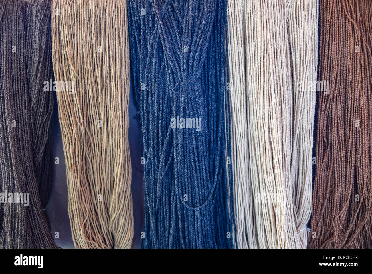 Naturally dyed alpaca wool for traditional textile weaving. Arequipa, Peru Stock Photo