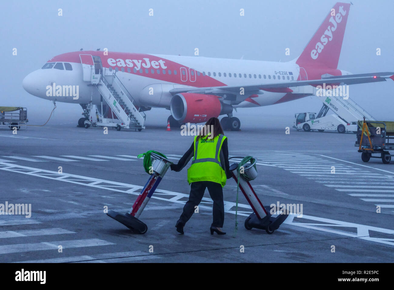 Berlin Tegel airport, aircraft Easyjet in the morning mist Stock Photo
