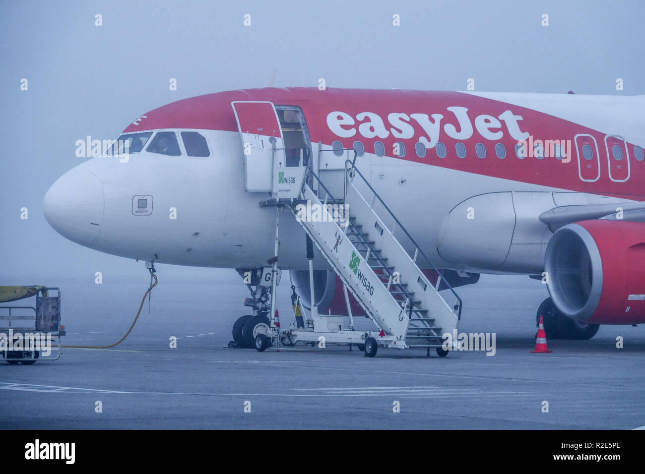 Berlin Tegel airport in the morning mist, Easyjet aircraft Stock Photo