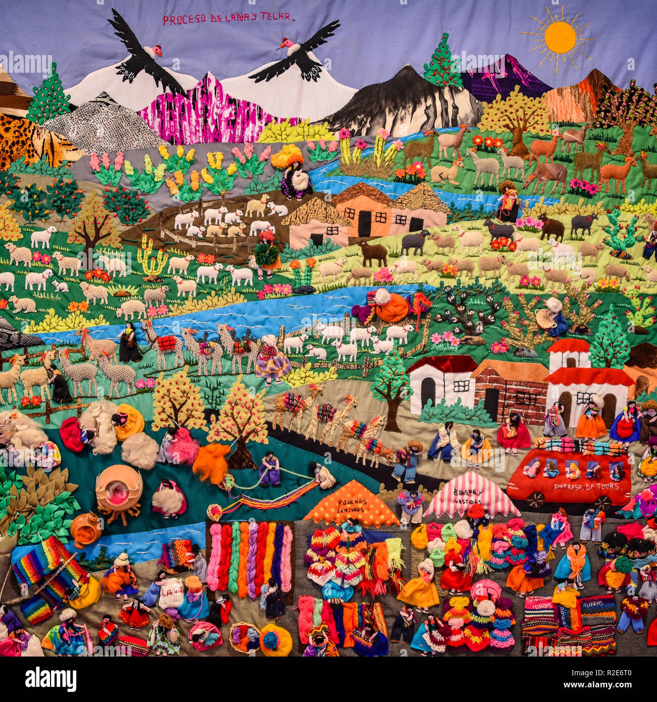 Arequipa, Peru - October 2018: Elaborate tapestry depicting traditional rural life in the Peruvian Andes Stock Photo