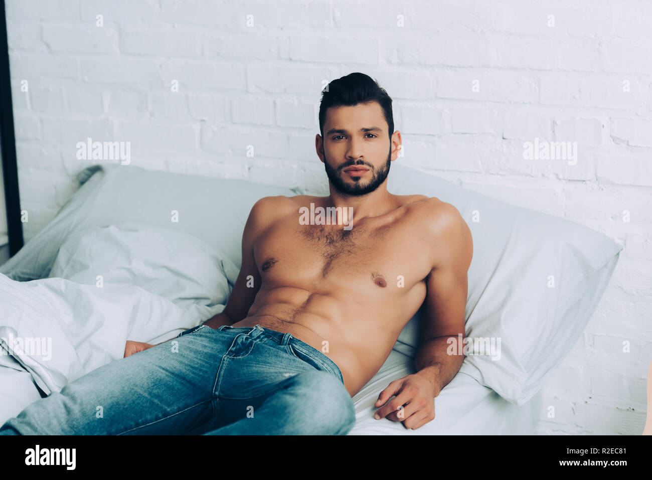 Shirtless man in jeans 2025