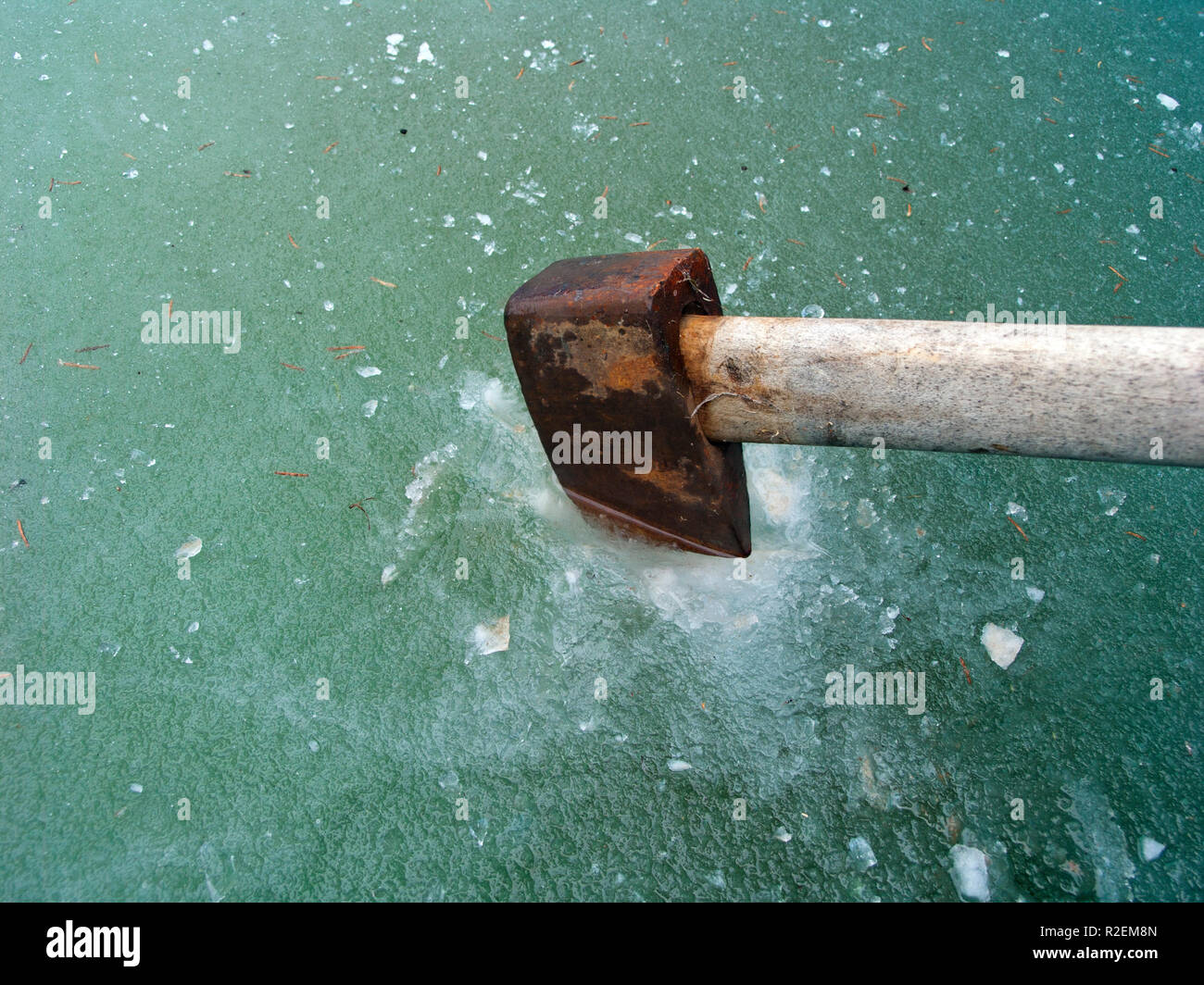Making Hole In Ice Stock Photo Alamy