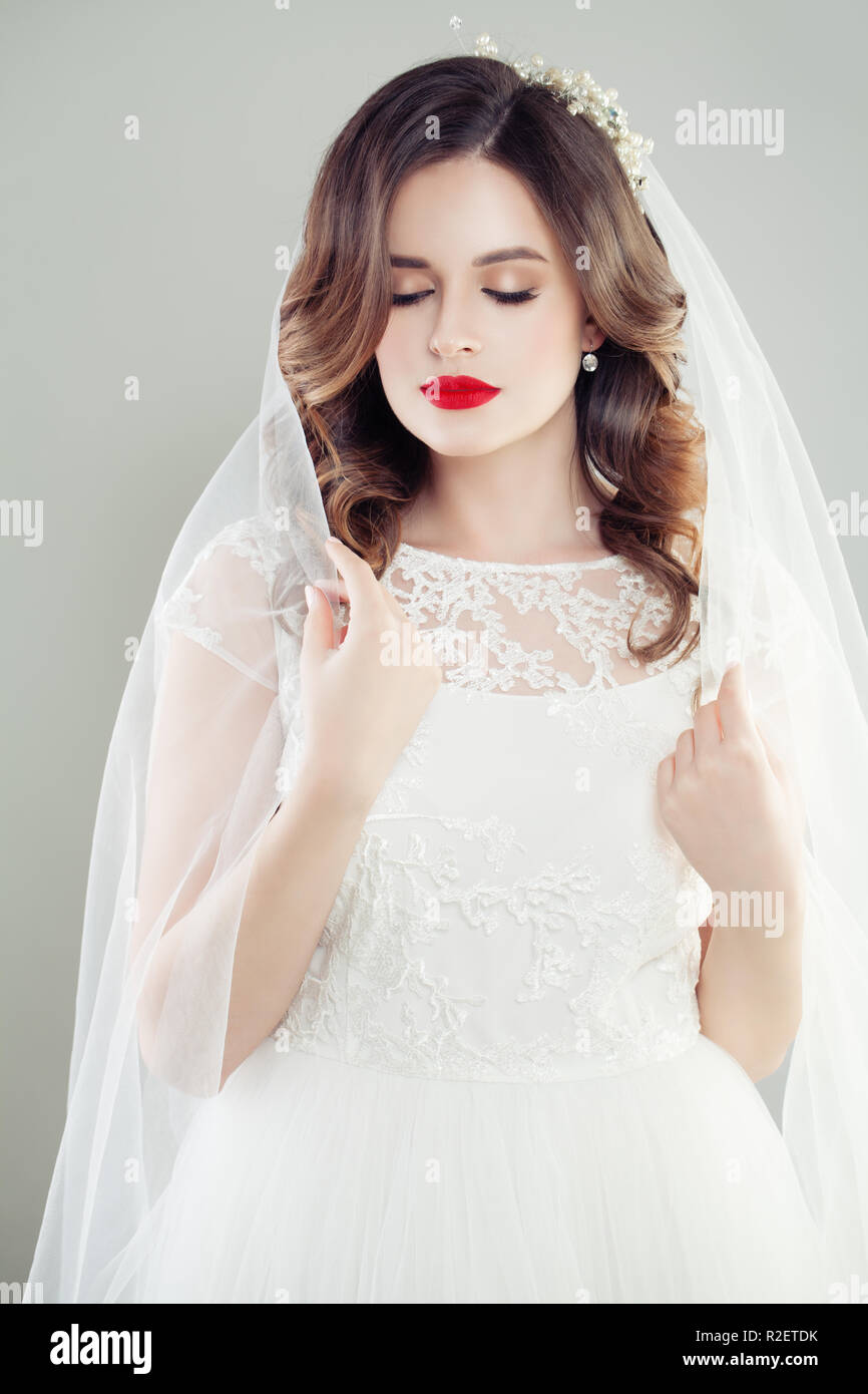 Perfect bride woman with makeup, bridal hairdo and veil portrait Stock Photo
