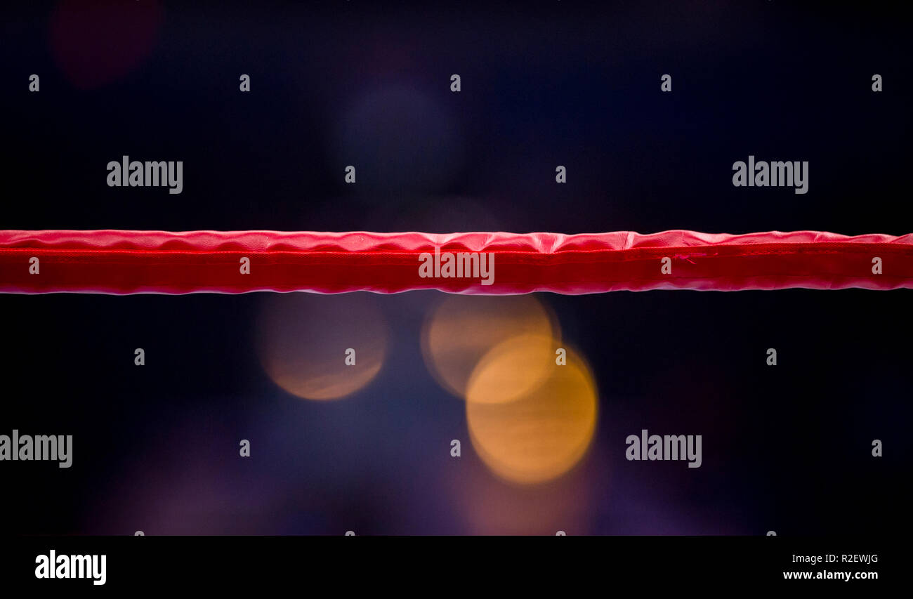 Boxing ring ropes with a blur spotlight Stock Photo Alamy