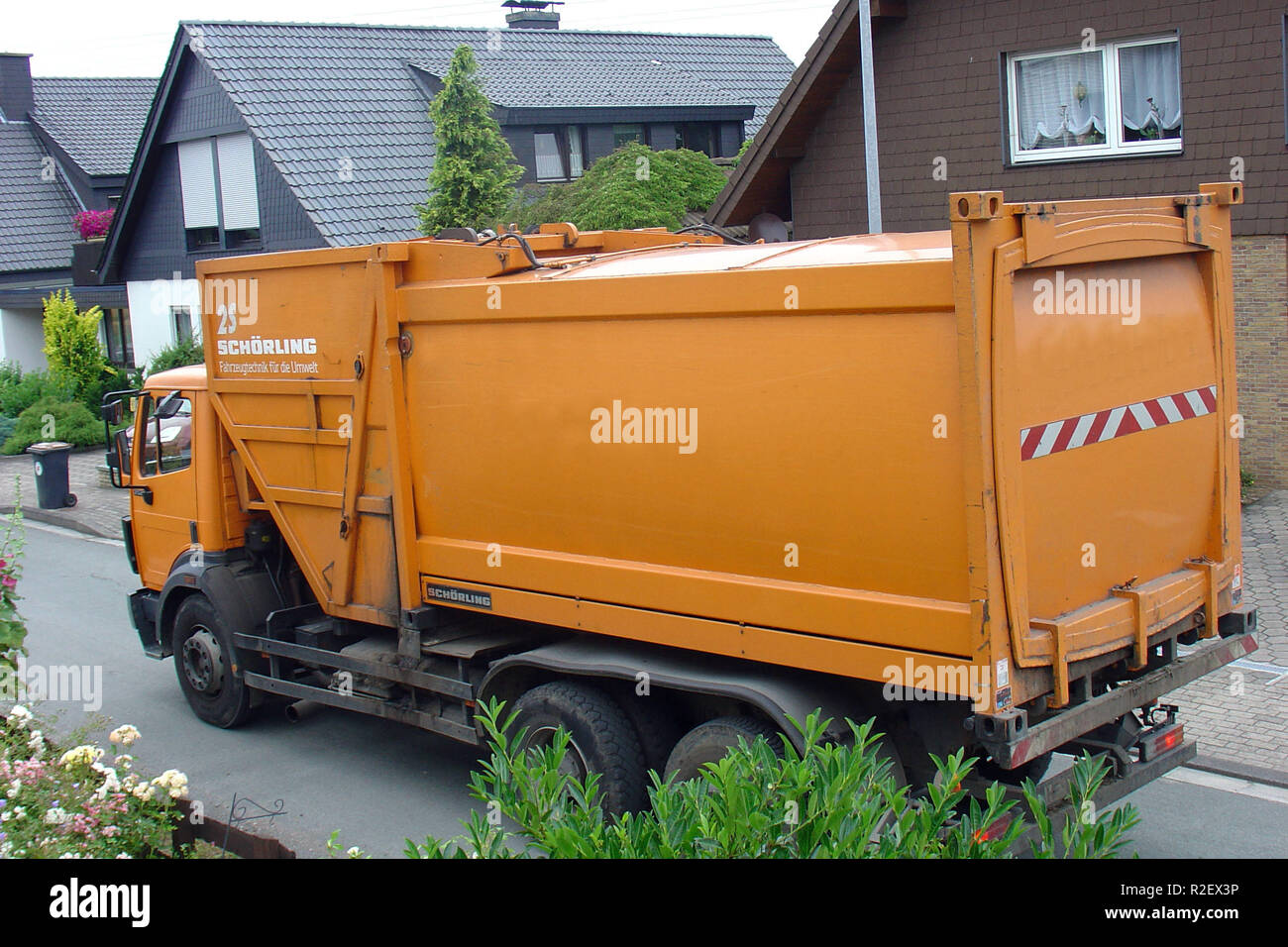 the garbage truck comes Stock Photo Alamy