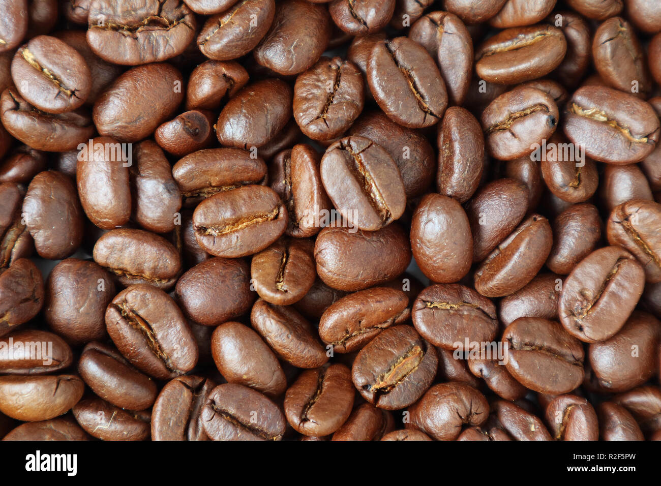Top view of heap of roasted coffee beans for background or banner Stock ...