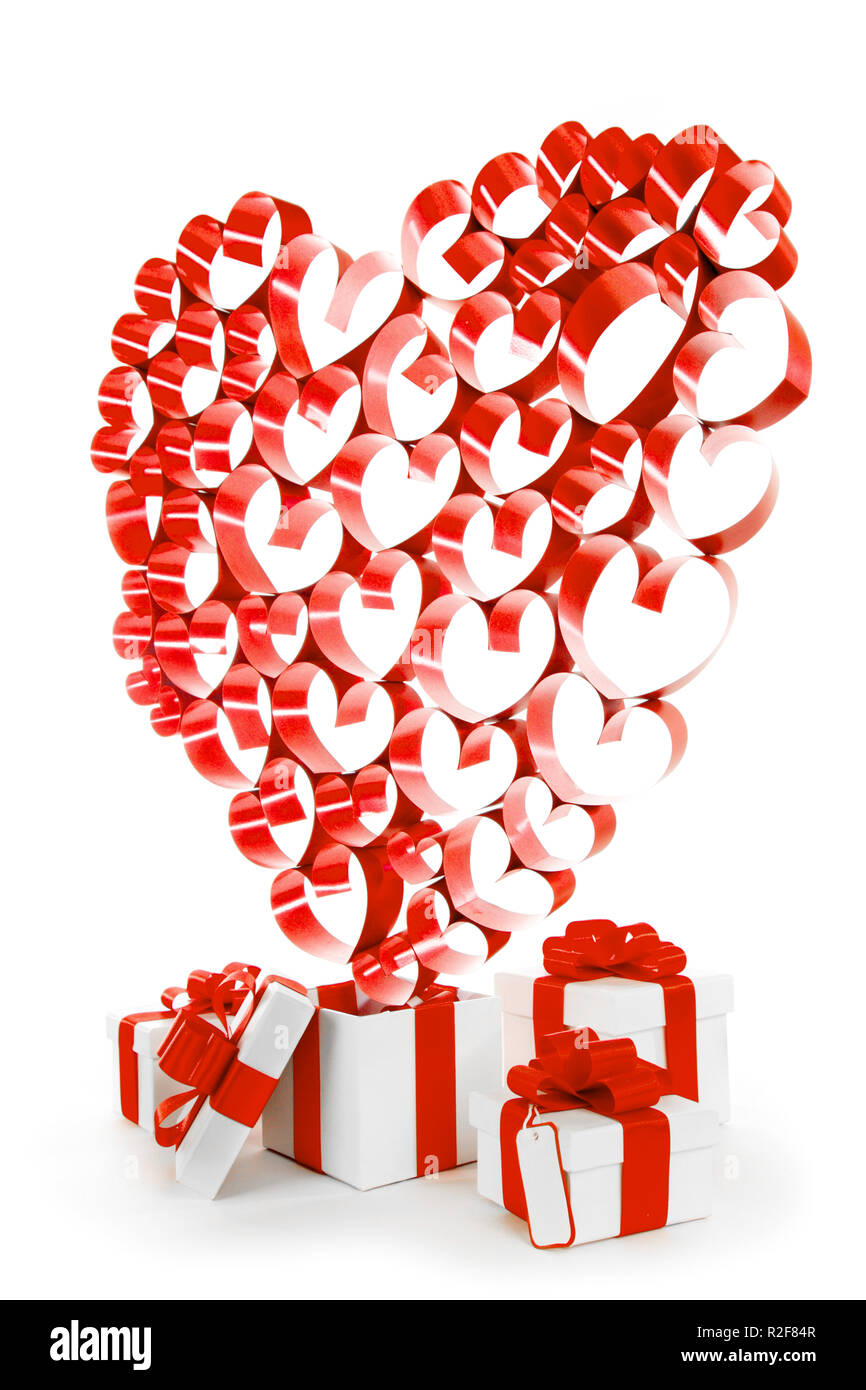 Valentines day gifts in white boxes with red ribbons and hearts