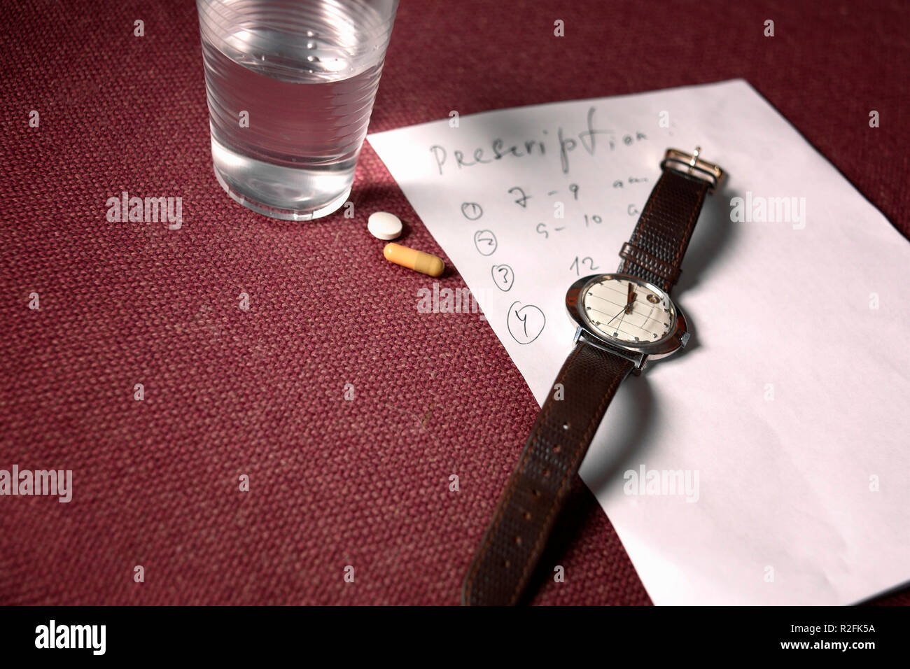 Hand written medication reminder Stock Photo