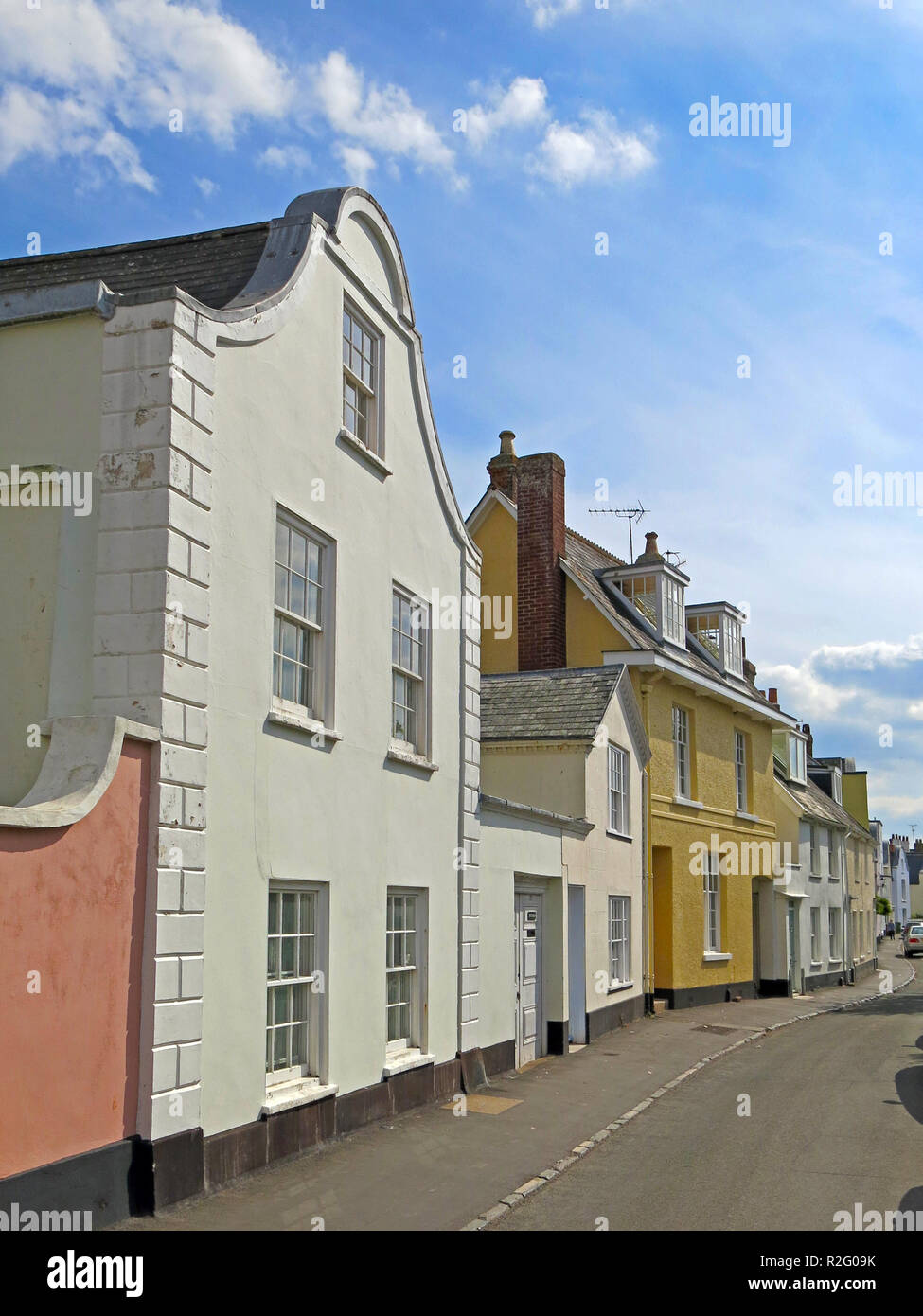 Many of the colourful houses in The Strand have the distinctive rounded 'Dutch Gables' in Topsham, Devon, England, UK Stock Photo