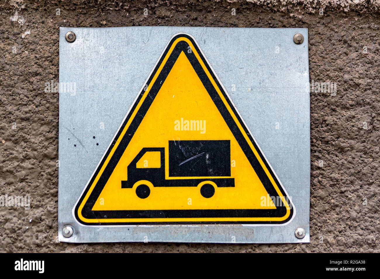 Close up yellow sign with image of truck Stock Photo