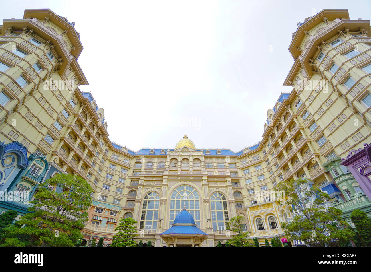 The Tokyo Disneyland Hotel located in front of the Tokyo Disneyland park with the Tokyo Disneyland station of the Disney Resort Line monorail system i Stock Photo
