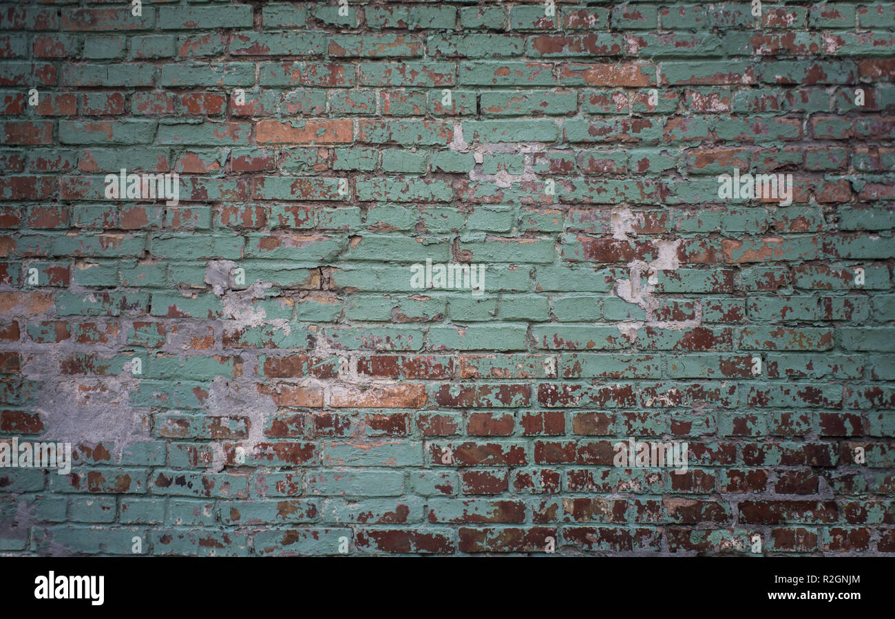 Tiled grunge industrial green and red brick wall background in Kyiv,  Ukraine. May be used in design and interiors Stock Photo - Alamy