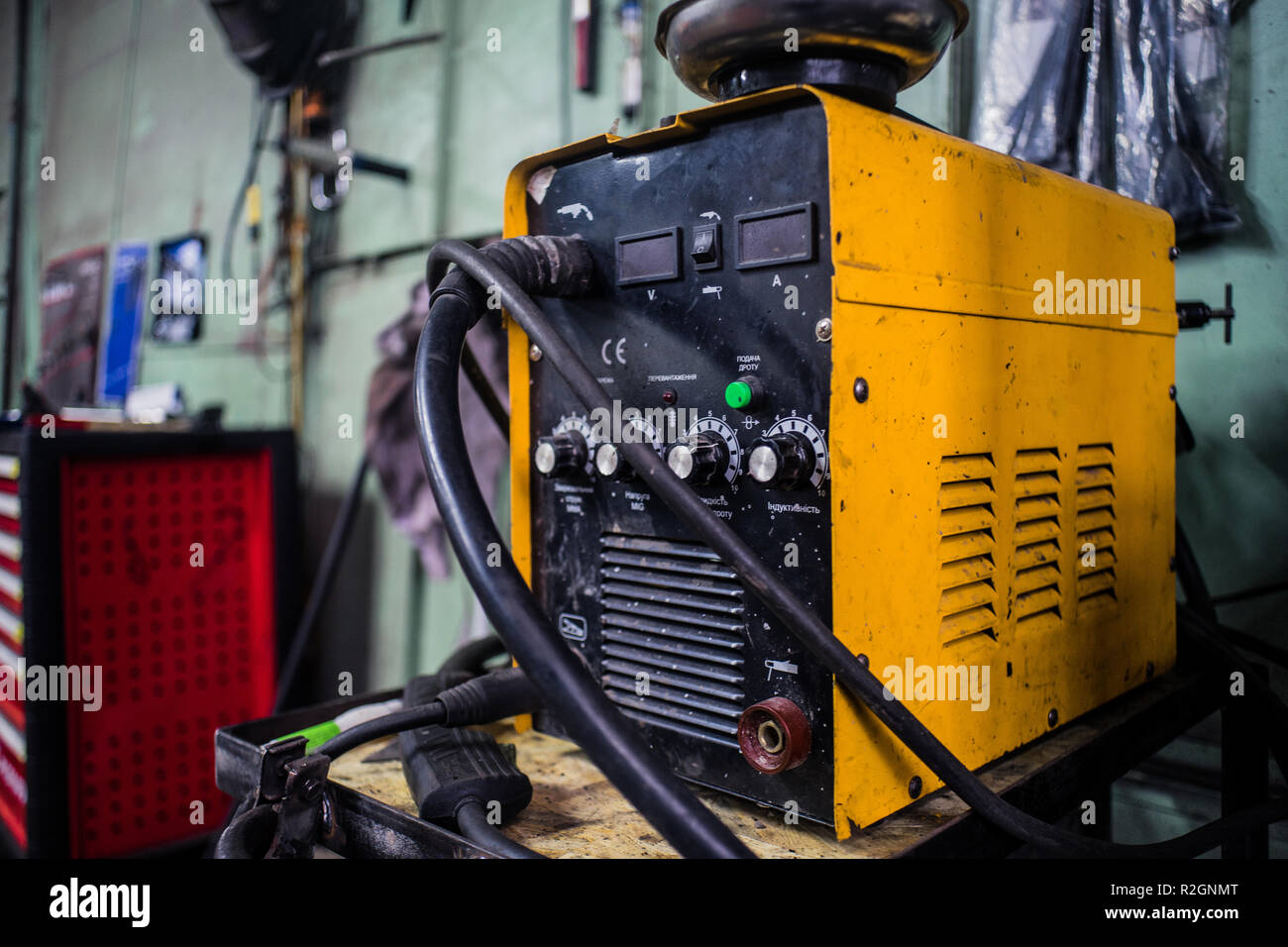 Welding MIG machine in yellow color, used in workshop Stock Photo