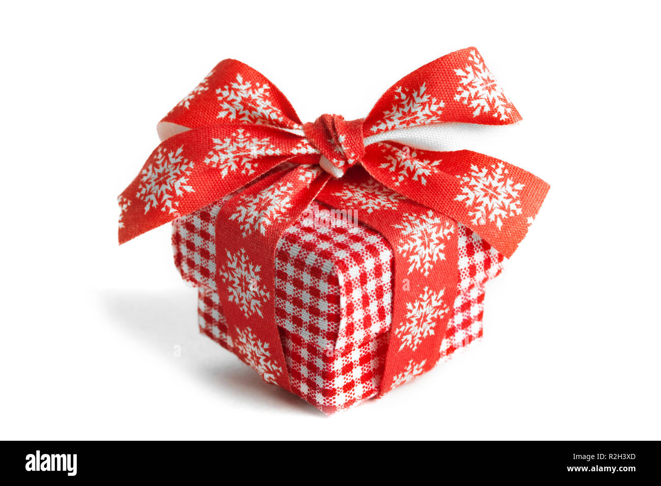 Christmas gift box with red ribbon isolated on white background Stock ...