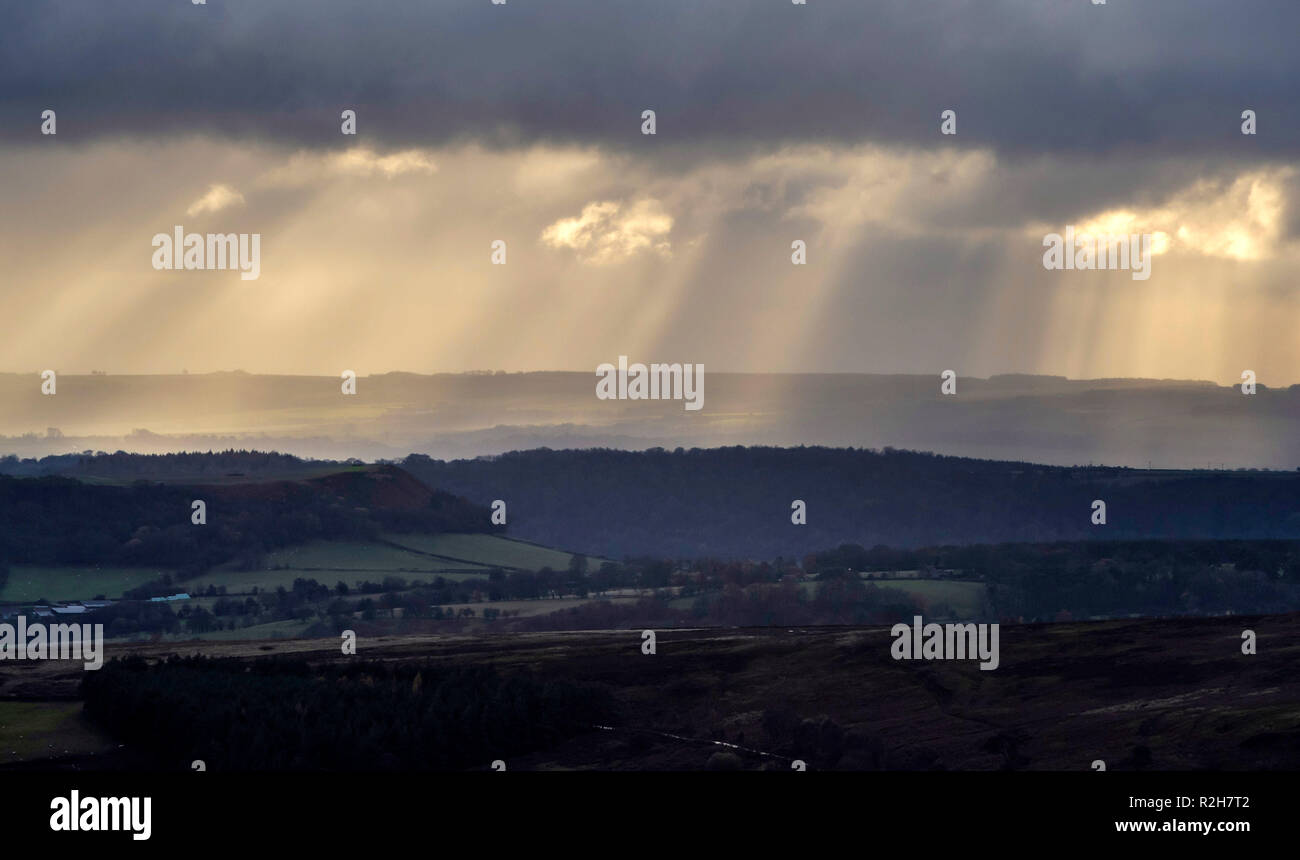 Crepuscular rays over the North York Moors, as temperatures plummet across the UK. Stock Photo